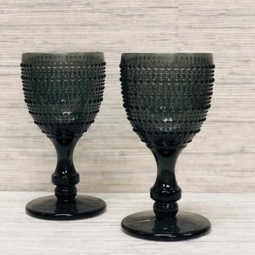 VIntage-inspired glassware has never looked so “au courant” as this Pebble Finish Goblet! Made of glass with a beautiful smokey grey finish